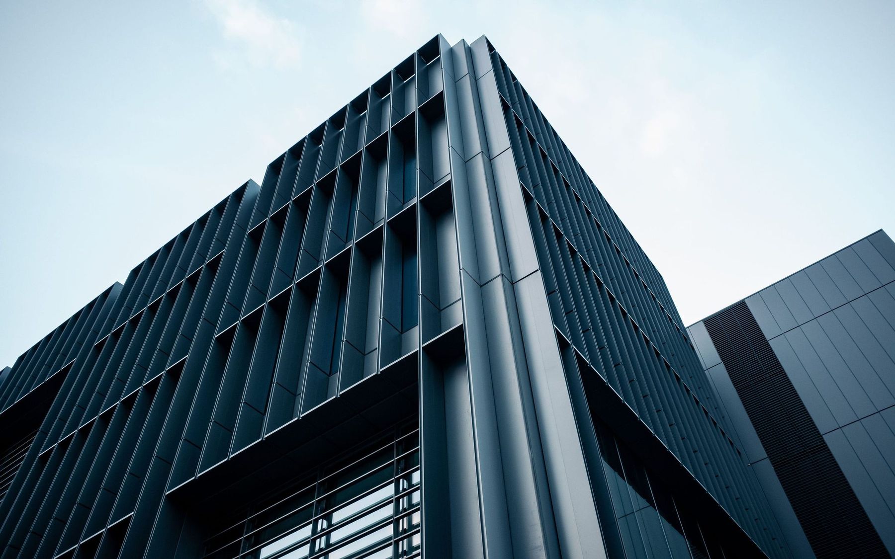 Contemporary architecture with a curved colonnade facade